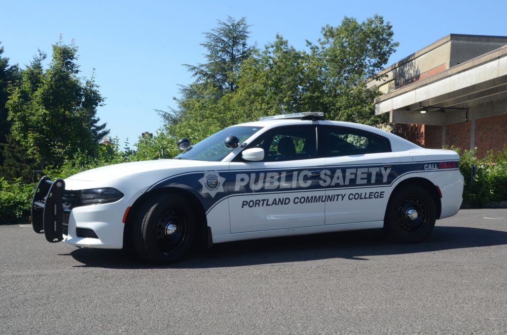 Public safety vehicle in front of trees
