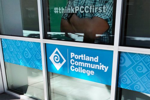 PCC logo and #thinkPCCfirst on a window at the Hillsboro Center