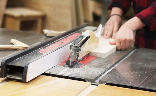 Student using a table saw